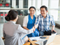 Couple meeting with their financial advisor